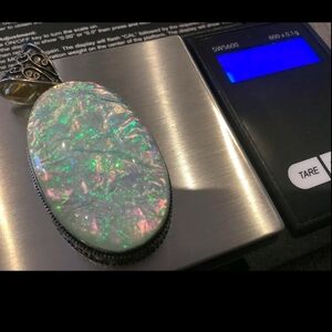 Opal Pendant with Silver Accents